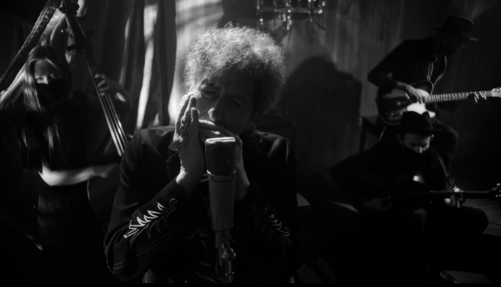 Bob Dylan still masters the harmonica during "Shadow Kingdom."