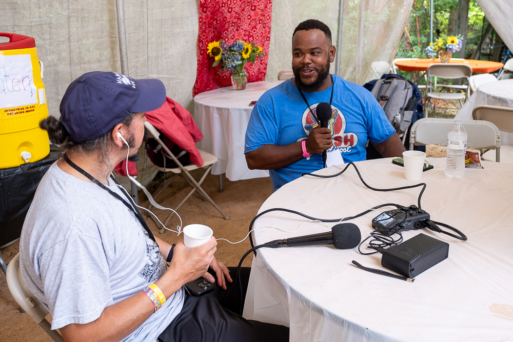 Brian Walker talks about his journey with A Day Without Love for The High Note with Shaun Smith at the 61st annual Philadelphia Folk Festival (Justyna Smith/ The High Note).