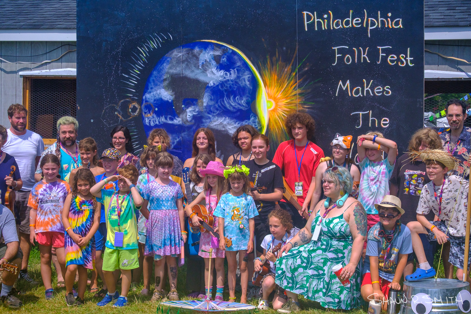 Members of the Great Groove Band pose for a photo before their Martin Guitar Main Stage performance at the 62nd annual Philadelphia Folk Festival Sunday, Aug. 17, 2025 (Shaun R. Smith/ The High Note).