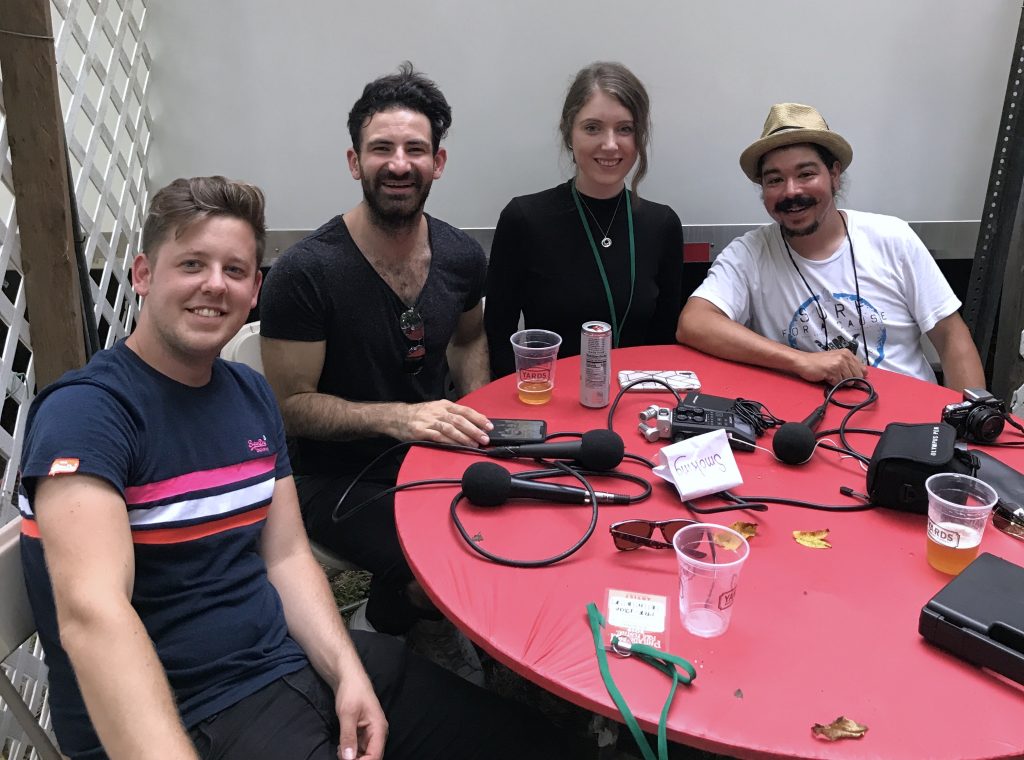 The members of Talisk, guitarist Graeme Armstrong, concertina player Mohsen Amini, fiddle player Hayley Keenan and Shaun Smith record The High Note podcast Sunday, Aug. 18, 2019 at the 58th annual Philadelphia Folk Festival (Dave Gunning/The High Note).