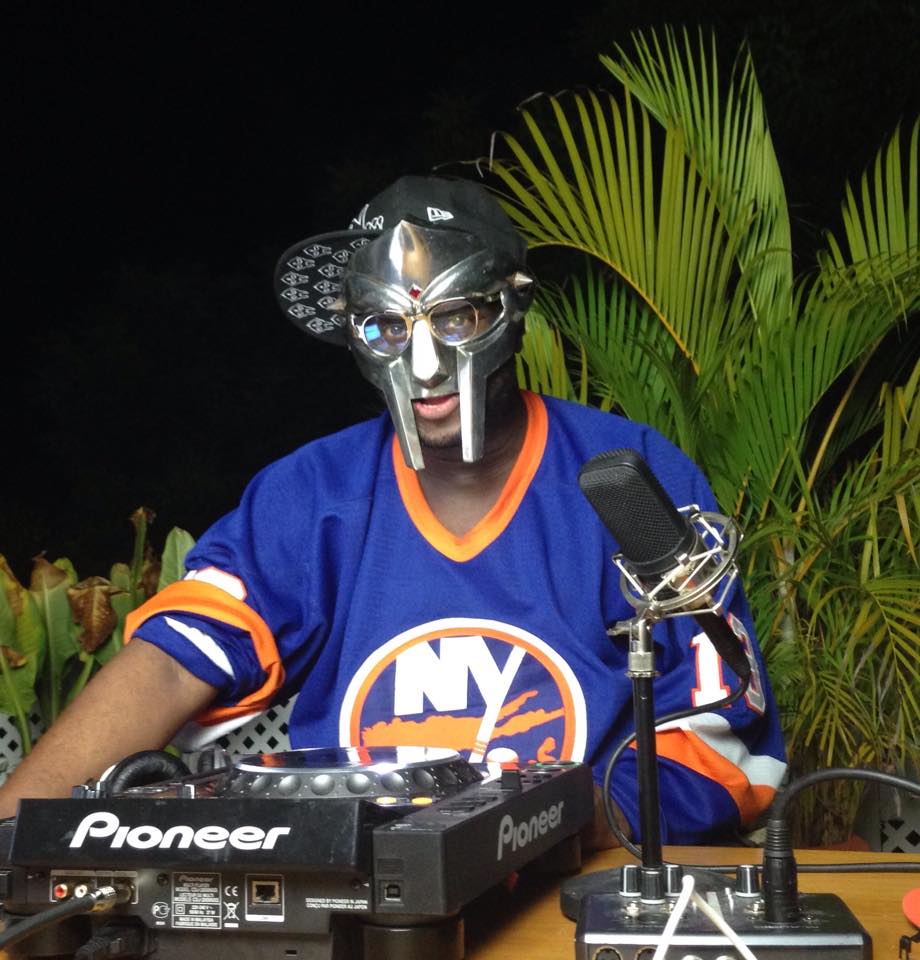 MF Doom wearing his mask and a New York Islanders sweater.