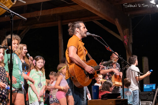 Adam Ezra Group with Shanna in a Dress and Miss Emily sing "I Wanna Dance with Somebody (Who Loves Me)" by Whitney Houston with the help of their youngest fans (Shaun R. Smith/ The High Note).