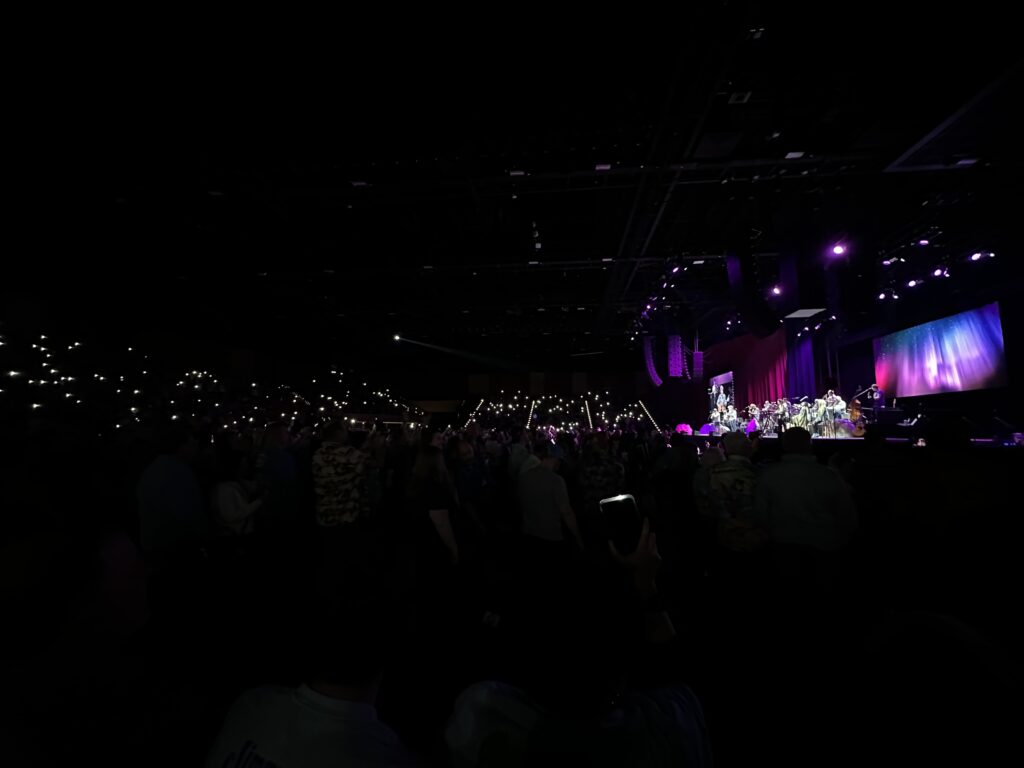 The crows uses their flashlights to pay tribute to Jimmy Buffett during a Coral Reefer Band concert Jan. 24, 20254 at Hard Rock Live in Atlantic City, New Jersey.